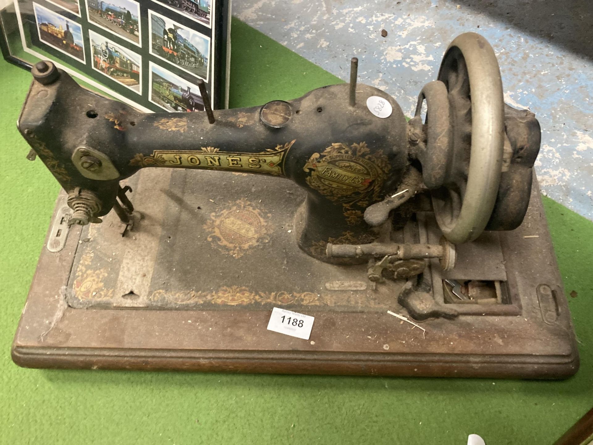 A VINTAGE HAND TURNED JONES SEWING MACHINE