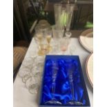 A QUANTITY OF GLASSES TO INCLUDE BRIDE AND GROOM FLUTES IN A PRESENTATION BOX, SHERRY, PORT AND