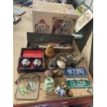 A MIXED LOT TO INCLUDE A PORCELAIN DOLL KIT, MINIATURE AMERICAN NUMBER PLATES, CHINESE STRESS BALLS,