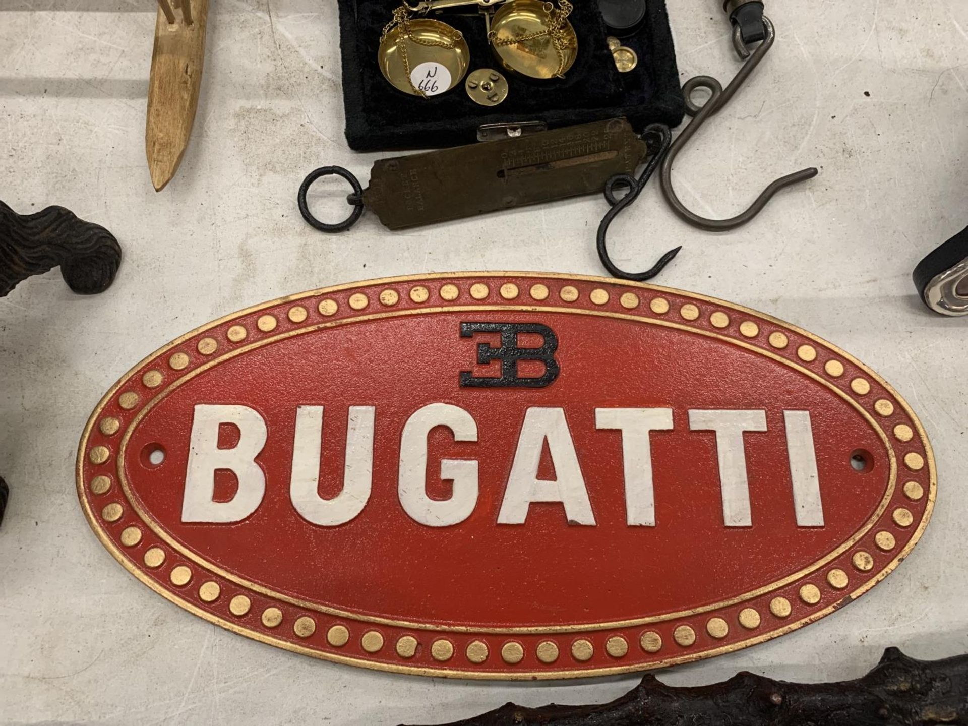 A VINTAGE STYLE CAST BUGATTI SIGN 35CM X 17CM