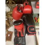 TWO PAIRS OF BOXING GLOVES FAMILY MARTIAL ARTS AND HEAVY HITTERS