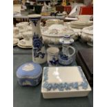 THREE PIECES OF DELFT BLUE AND WHITE POTTERY PLUS TWO PIECES OF WEDGWOOD