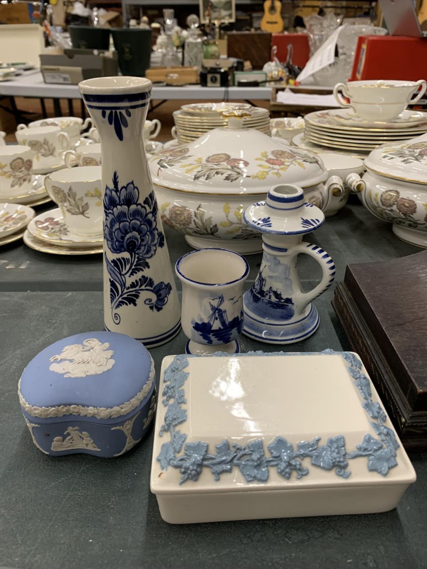 THREE PIECES OF DELFT BLUE AND WHITE POTTERY PLUS TWO PIECES OF WEDGWOOD