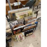 A LARGE ASSORTMENT OF FRAMED PRINTS AND PICTURES