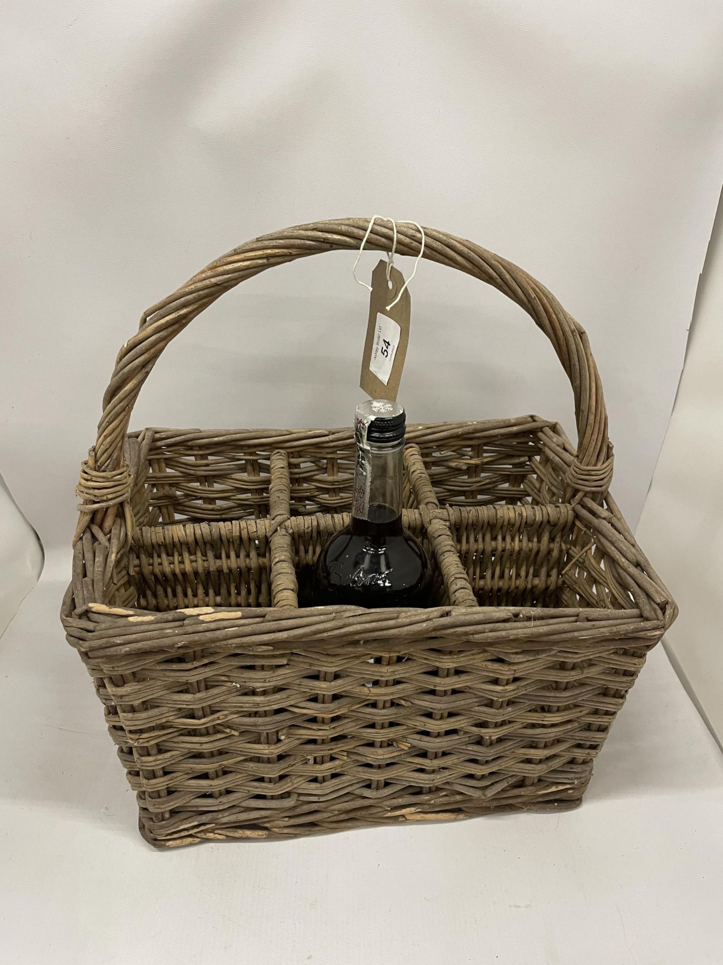 A VINTAGE SIX SECTION WICKER WINE CARRIER