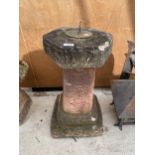 A RECONSTITUTED STONE SUNDIAL WITH PEDESTAL BASE AND BRASS GNOMON (H:58CM)