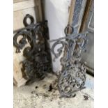 A PAIR OF CAST IRON PANELS