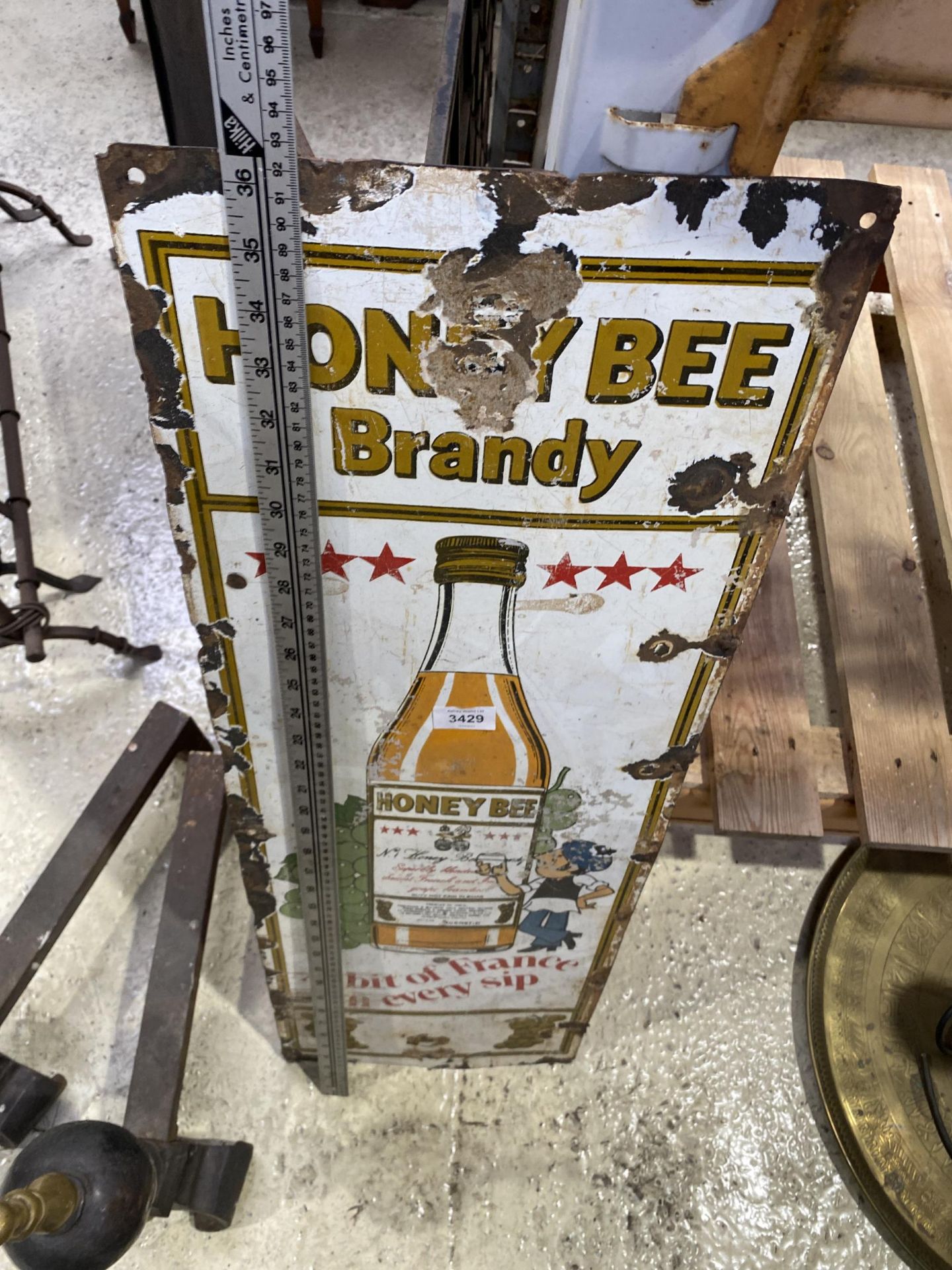 A VINTAGE HONEY BEE BRANDY SIGN, 36.5" HIGH (WORN) - Image 2 of 2