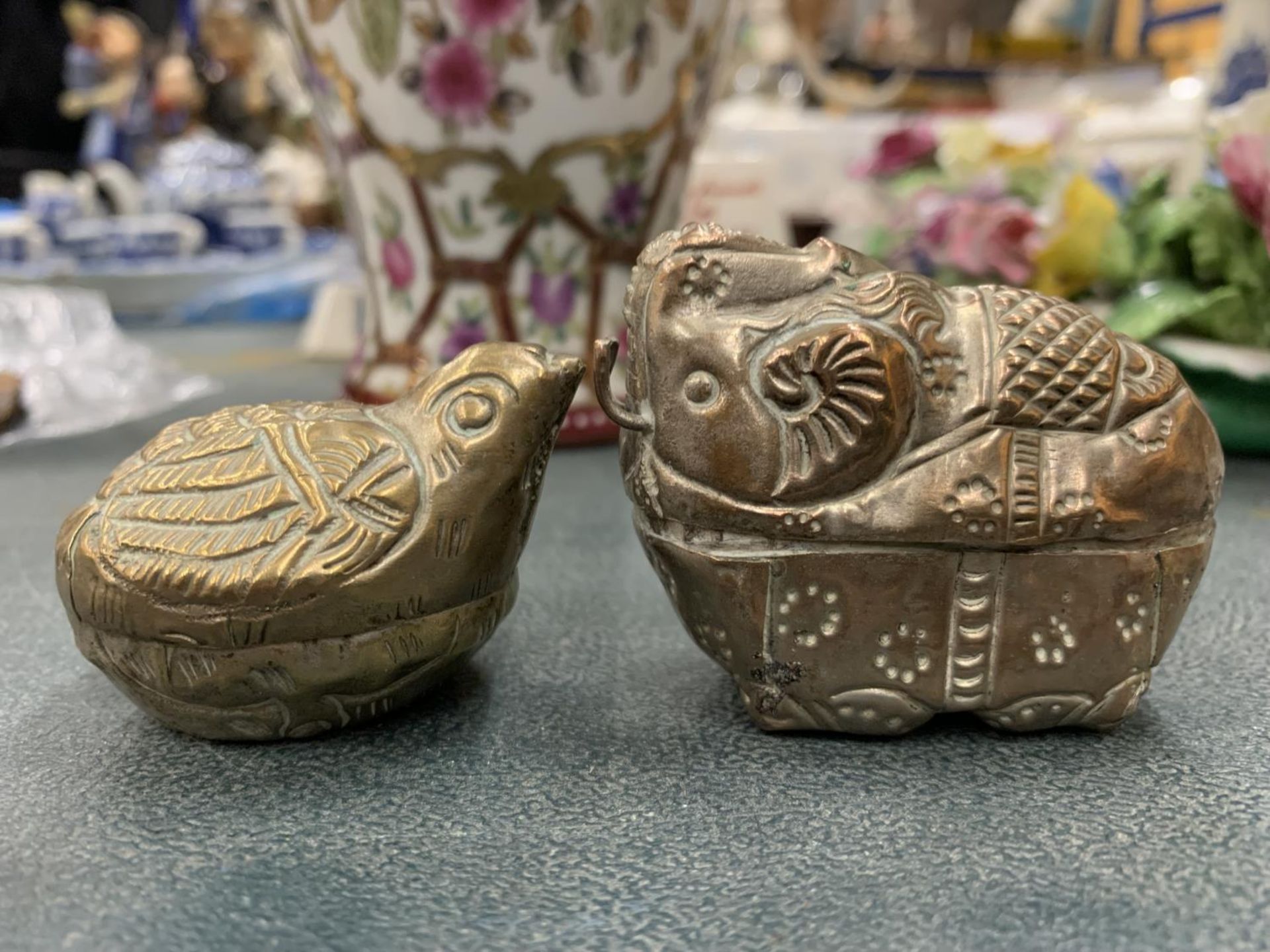 TWO WHITE METAL ANIMAL LIDDED POTS IN THE SHAPE OF ANIMALS