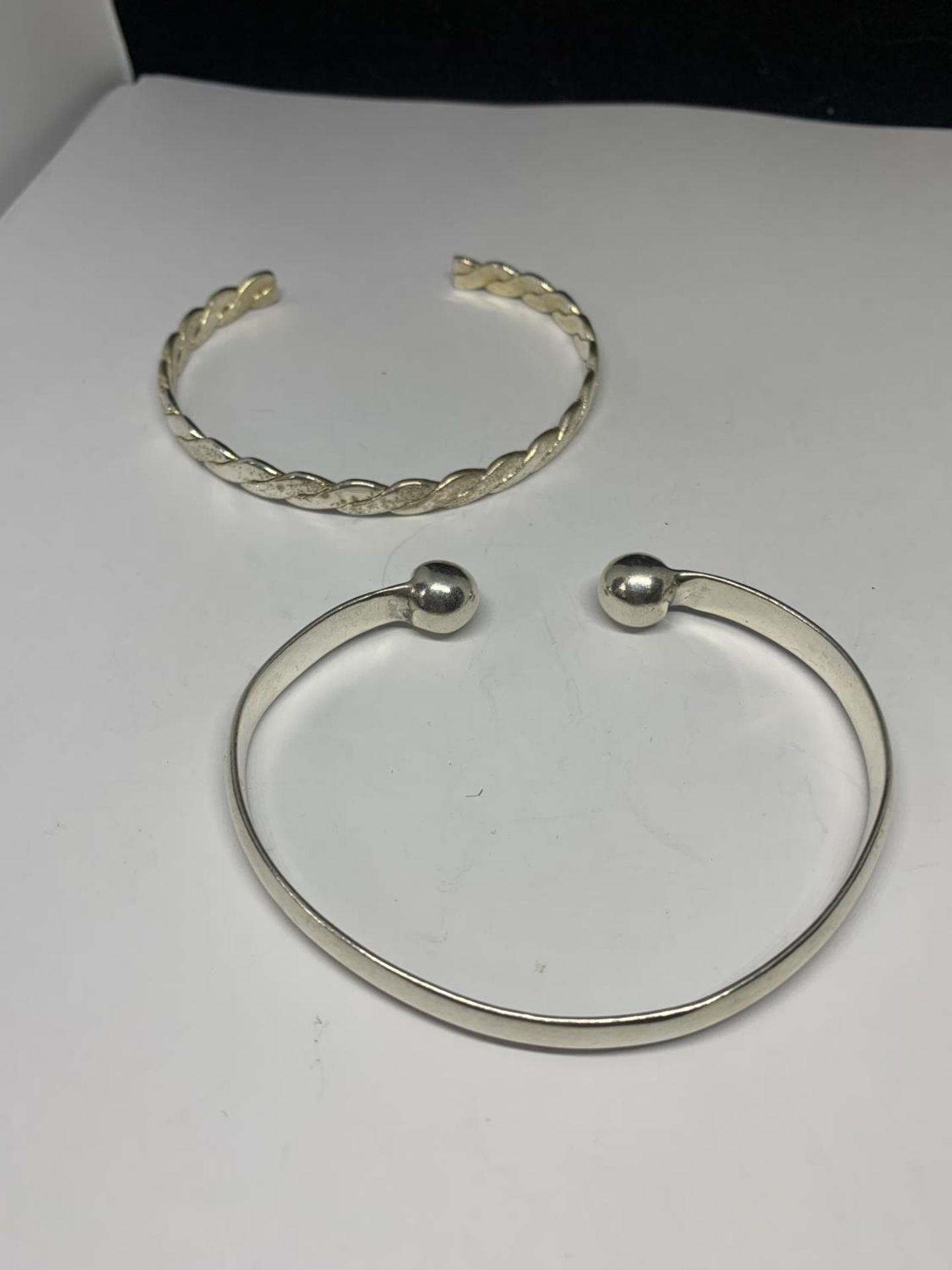 TWO SILVER BANGLES