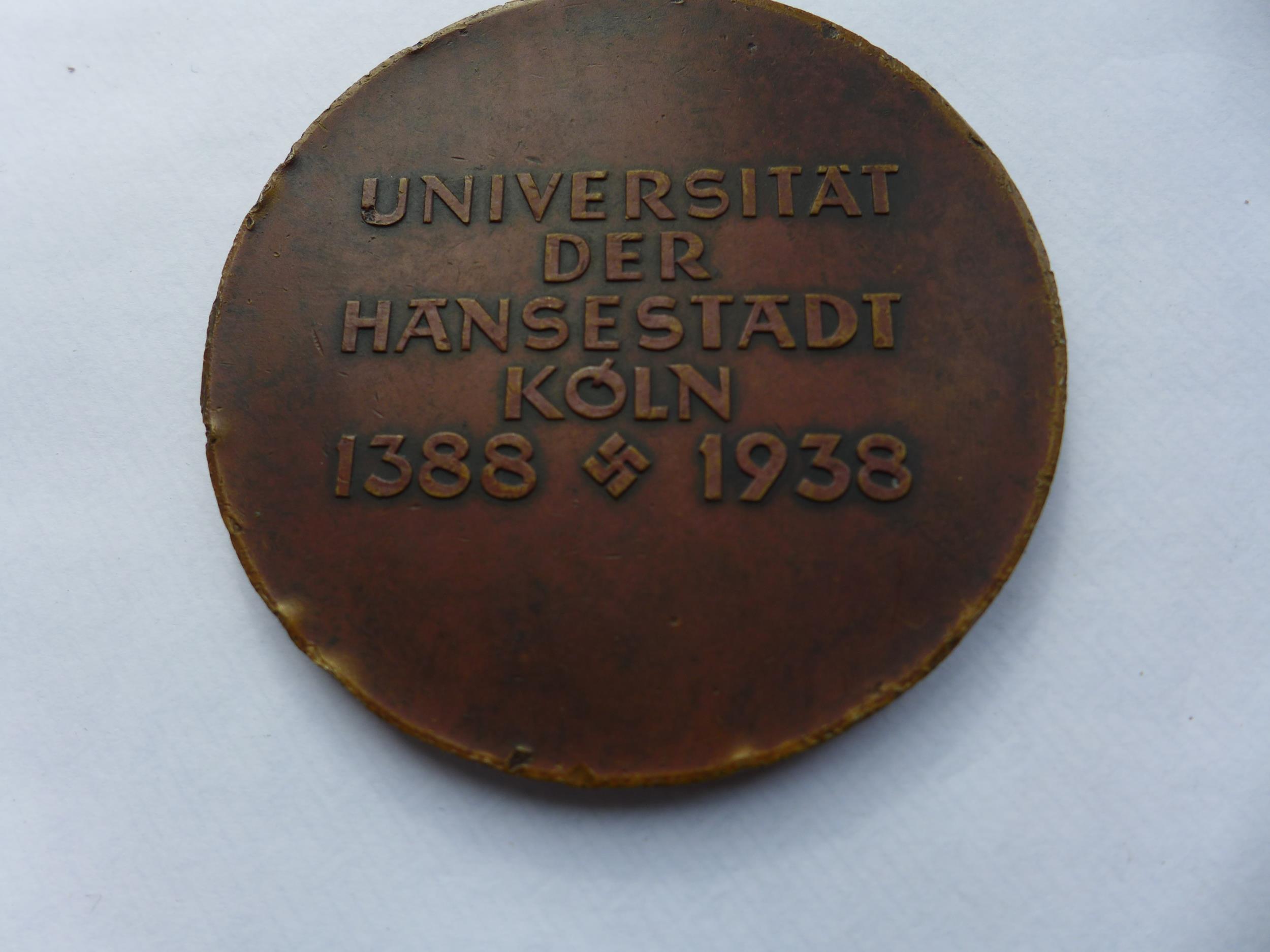 A NAZI GERMANY BRONZE UNIVERSITAT DER HANSCSTADT KOLN 1388-1938 550TH ANNIVERSARY MEDAL, 70MM