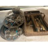 A QUANTITY OF VINTAGE FLATWARE IN A BASKET, PLUS THREE SILVER PLATED TRAYS, ETC