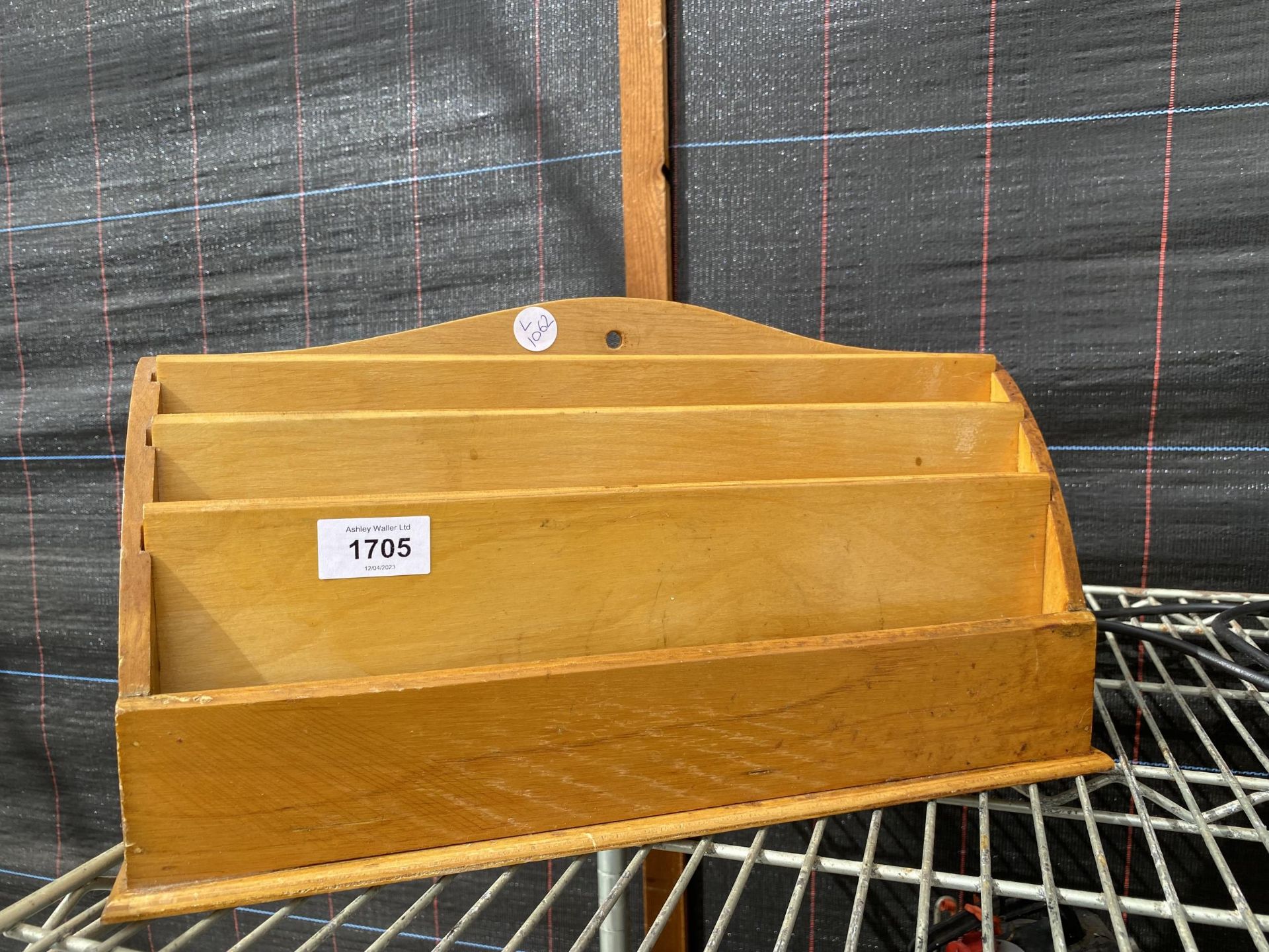 A WOODEN DESK TIDY LETTER RACK