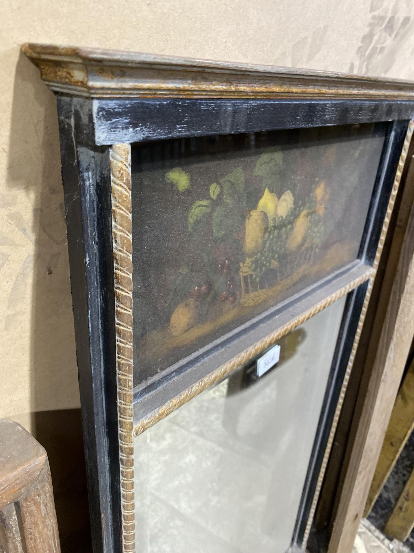 A VINTAGE GILT AND EBONISED MIRROR WITH STILL LIFE PAINTED SCENE - Image 2 of 2