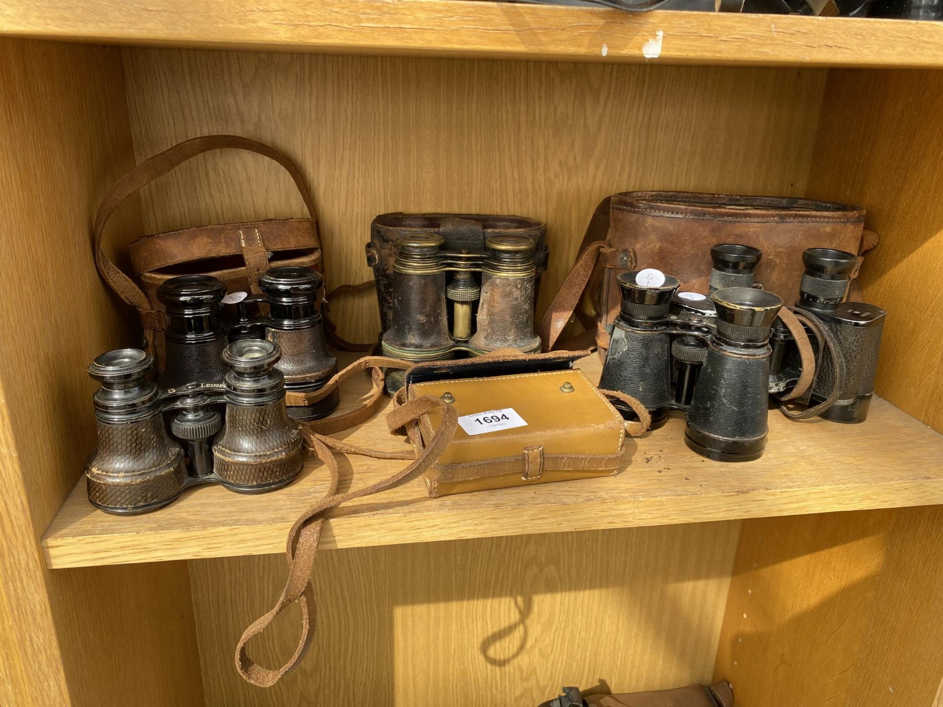 FIVE PAIRS OF VARIOUS BINOCULARS WITH CARRY CASES