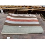 A VINTAGE STRIPED RUG / THROW