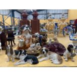 A QUANTITY OF DOG AND CAT ORNAMENTS TO INCLUDE A ST BERNARD, BEAGLE, COLLIE, ETC.,