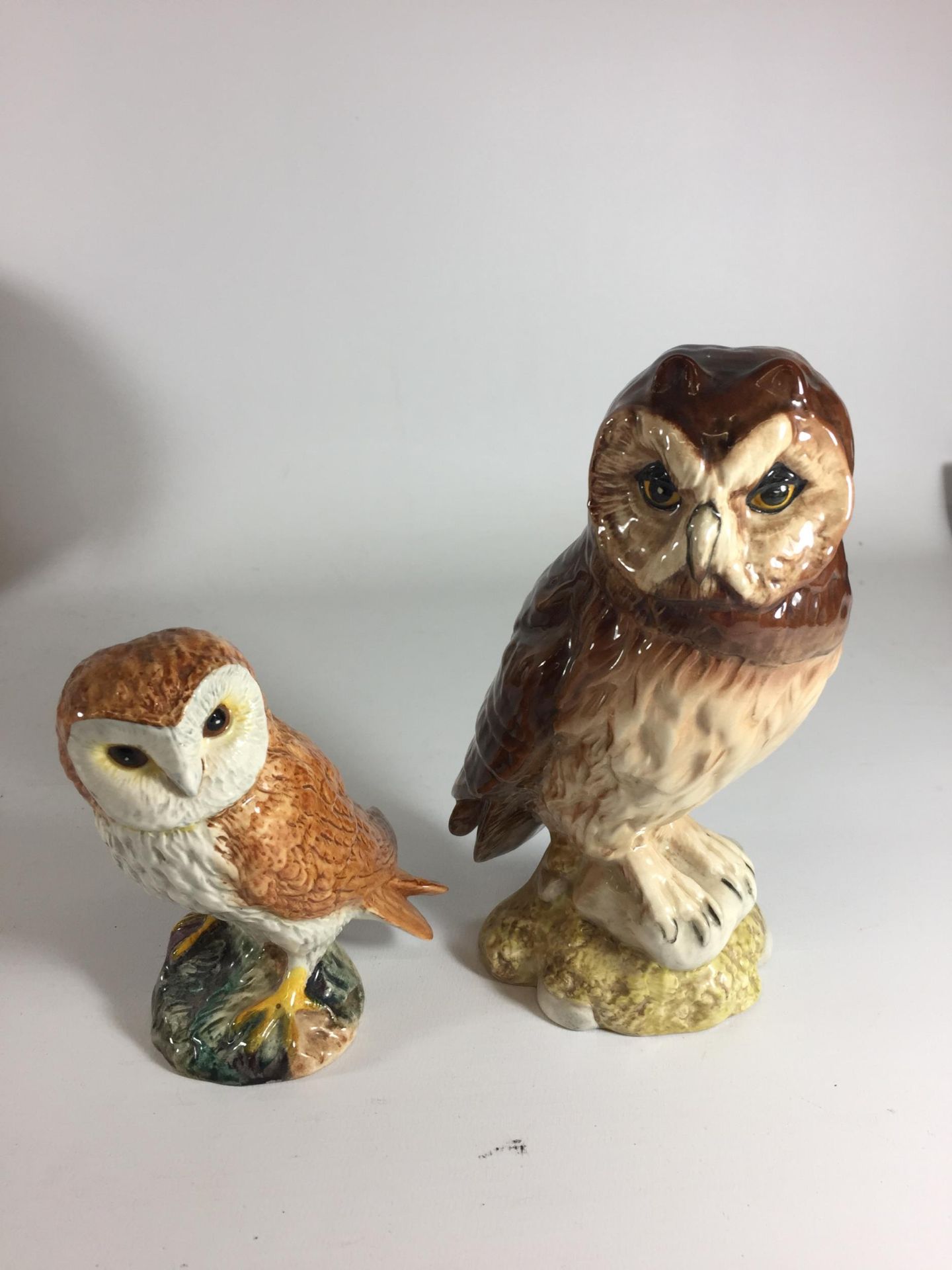 TWO CERAMIC OWL FIGURES - BESWICK BARN OWL & ROYAL DOULTON SHORT EARED OWL FOR WHYTE & MACKAY SCOTCH