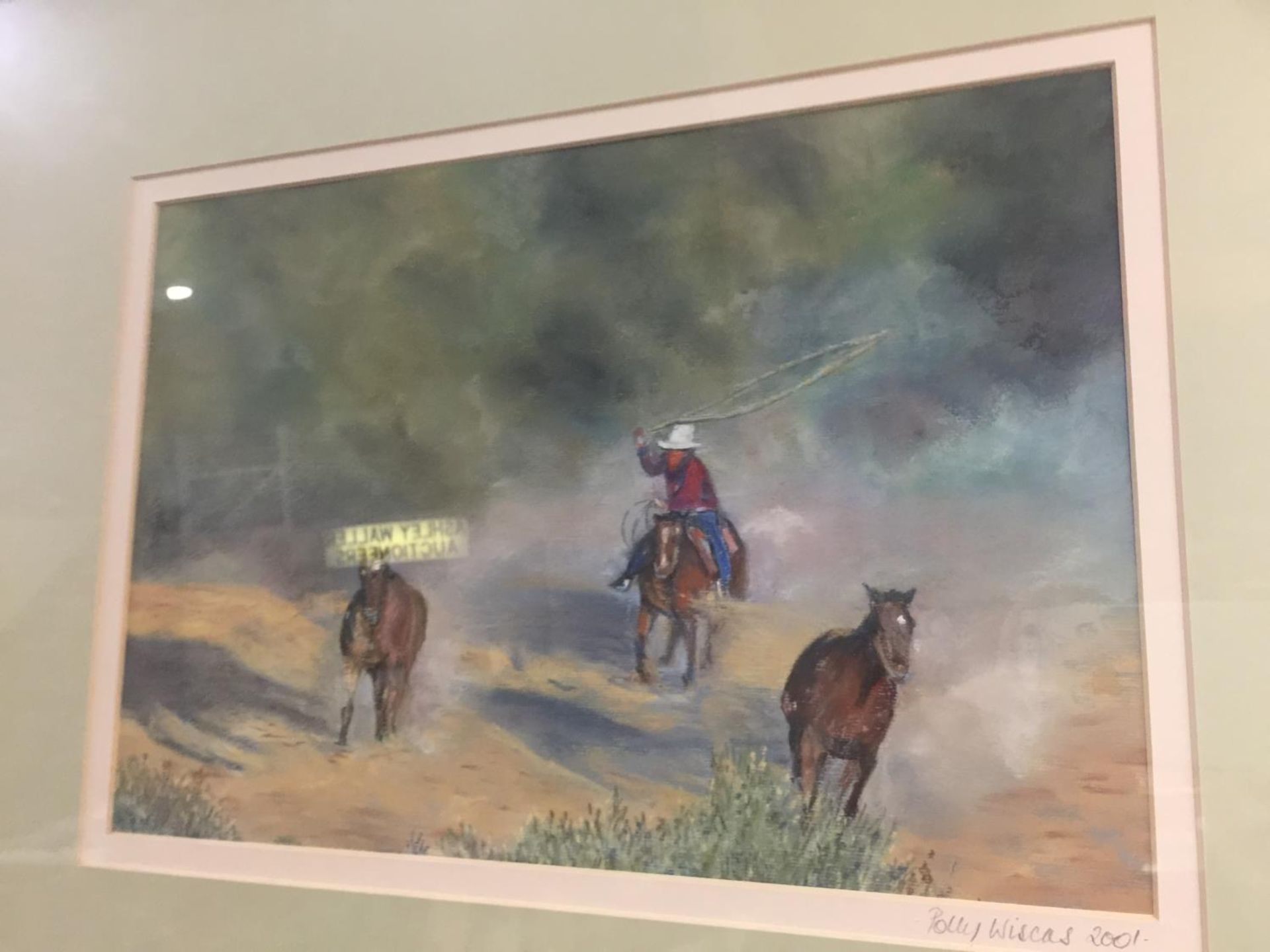 A FRAMED AND MOUNTED SIGNED PRINT 2001 BY POLLY WISCUS ARTIST OF COWBOY AND HORSES SCENE - Image 3 of 4