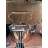 A LARGE VINTAGE COPPER KETTLE BEARING THE STAMP 'H.B S3'