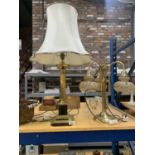 TWO BRASS TABLE LAMPS, ONE WITH A COLUMN STYLE BASE AND THE OTHER WITH THREE BRANCHES AND GLASS