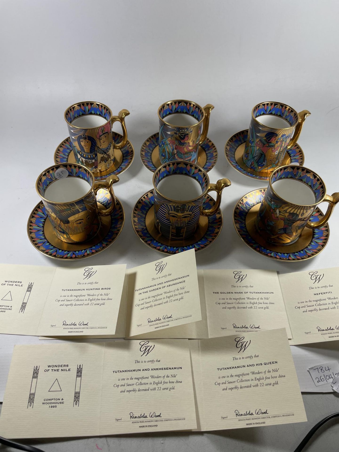 SIX COMPTON AND WOODHOUSE 'WONDERS OF THE NILE' CUPS AND SAUCERS - WITH CERTIFICATES OF AUTHENTICITY