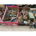 AN ASSORTMENT OF TOOLS TO INCLUDE GARDEN FORKS, SCREW DRIVERS AND HAMMERS ETC