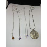 FOUR SILVER NECKLACES WITH PENDANTS