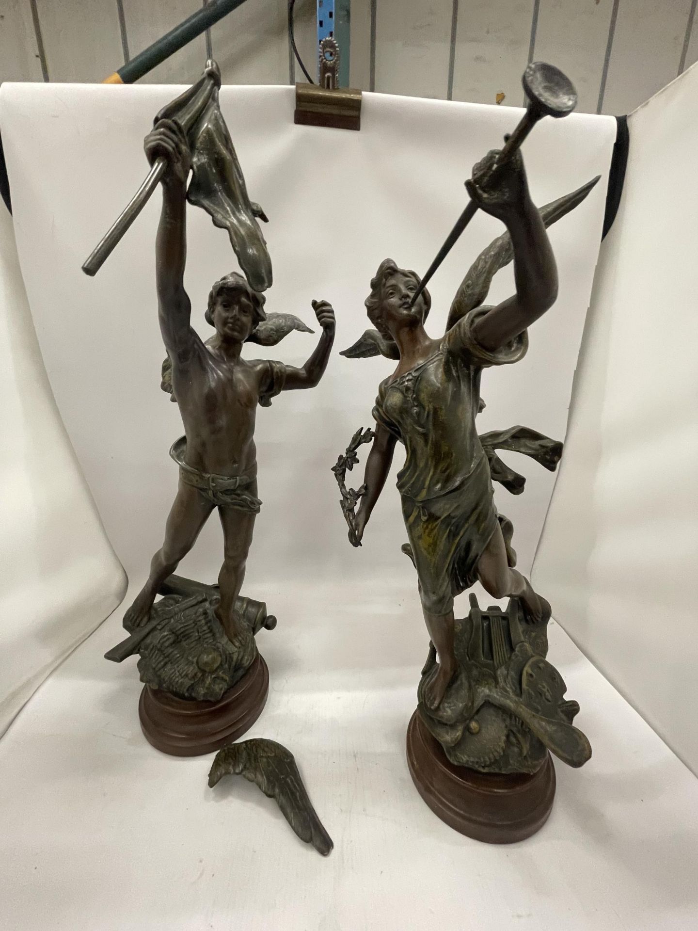 A PAIR OF VINGTAGE SPELTER CHERUB FIGURES, SIGNED (ONE WING A/F)