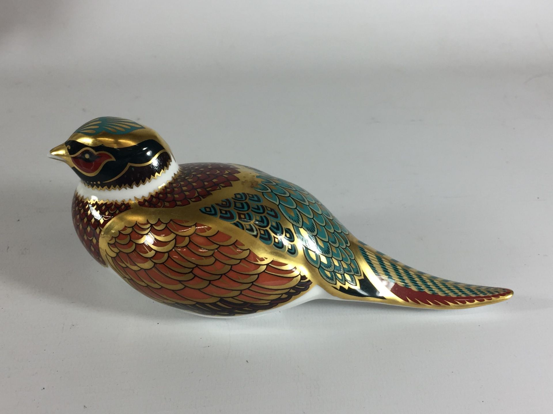 A ROYAL CROWN DERBY WOODLAND PHEASANT COLLECTORS GUILD PAPERWEIGHT, GOLD STOPPER