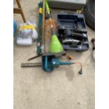 AN ASSORTMENT OF TOOLS TO INCLUDE A CIRCULAR SAW, A HEDGE TRIMMER AND A GRASS STRIMMER ETC