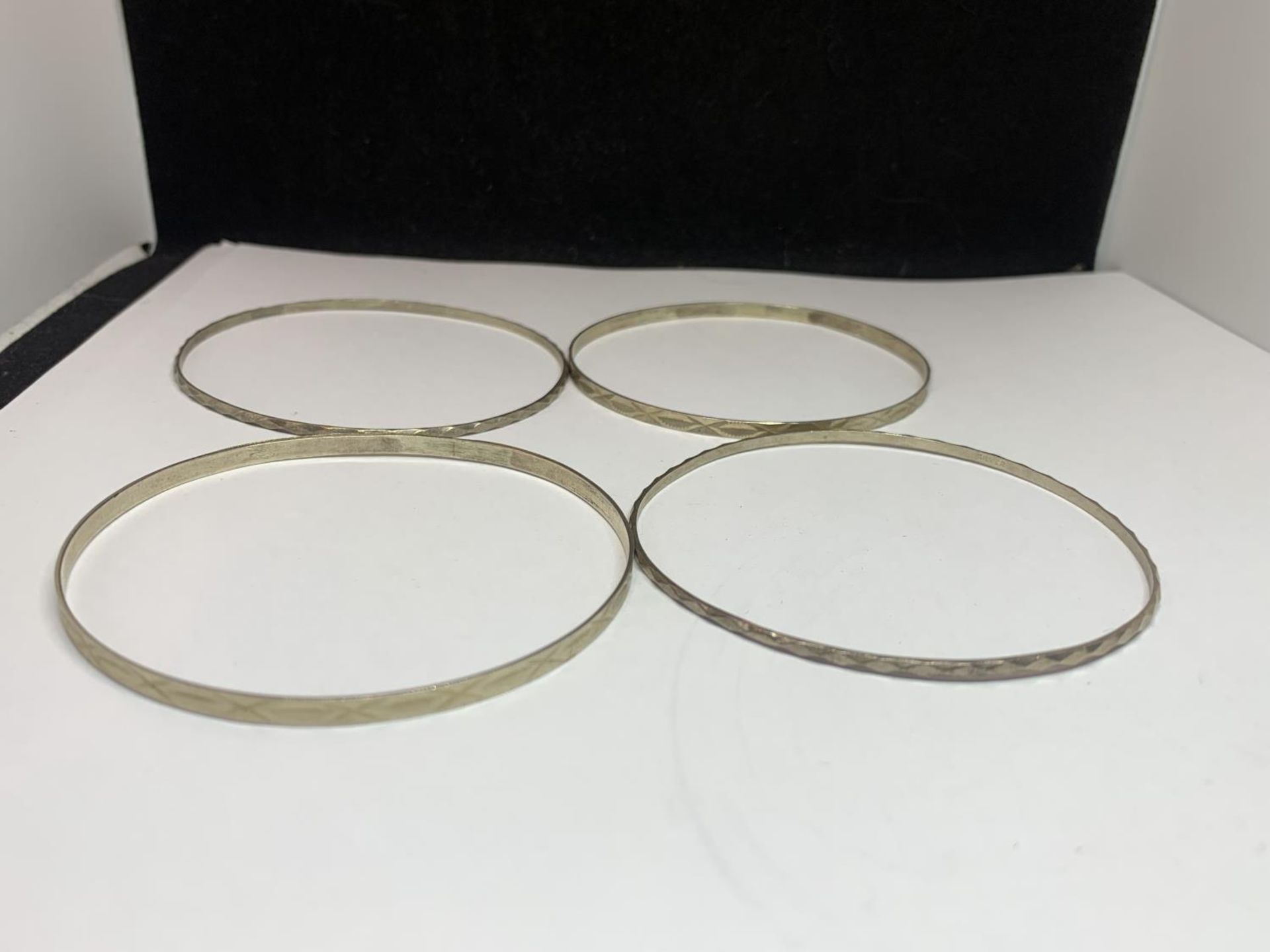 FOUR SILVER BANGLES - Image 2 of 3