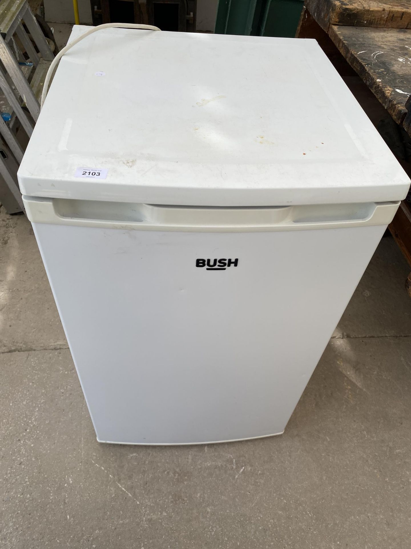 A WHITE BUSH UNDERCOUNTER FREEZER