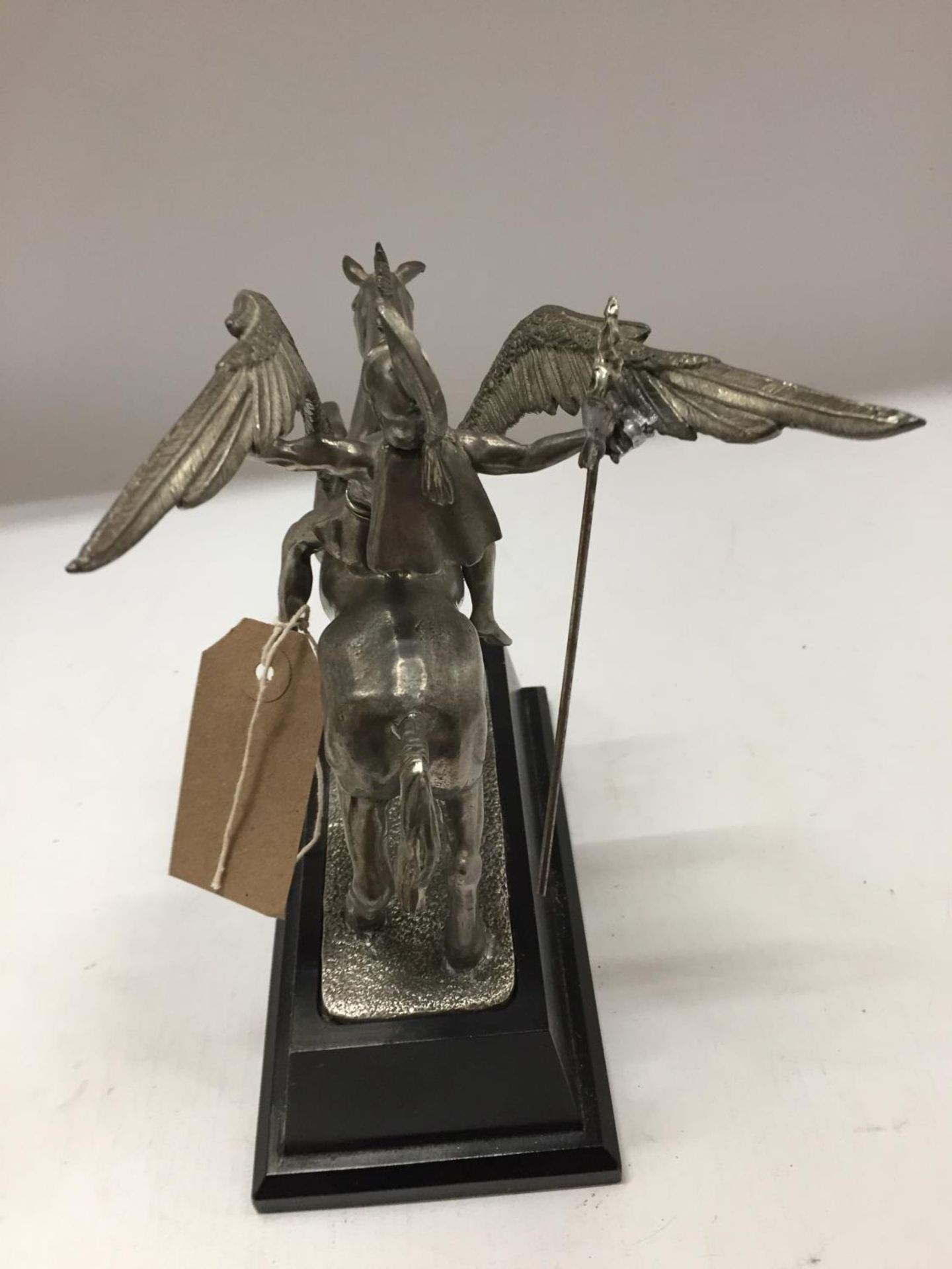 A WHITE METAL MODEL OF PEGASUS BEING RIDDEN BY PERSEUS, MOUNTED ON A BLACK WOODEN BASE,HEIGHT - Image 3 of 4