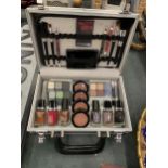 A METAL MAKE UP CASE AND CONTENTS