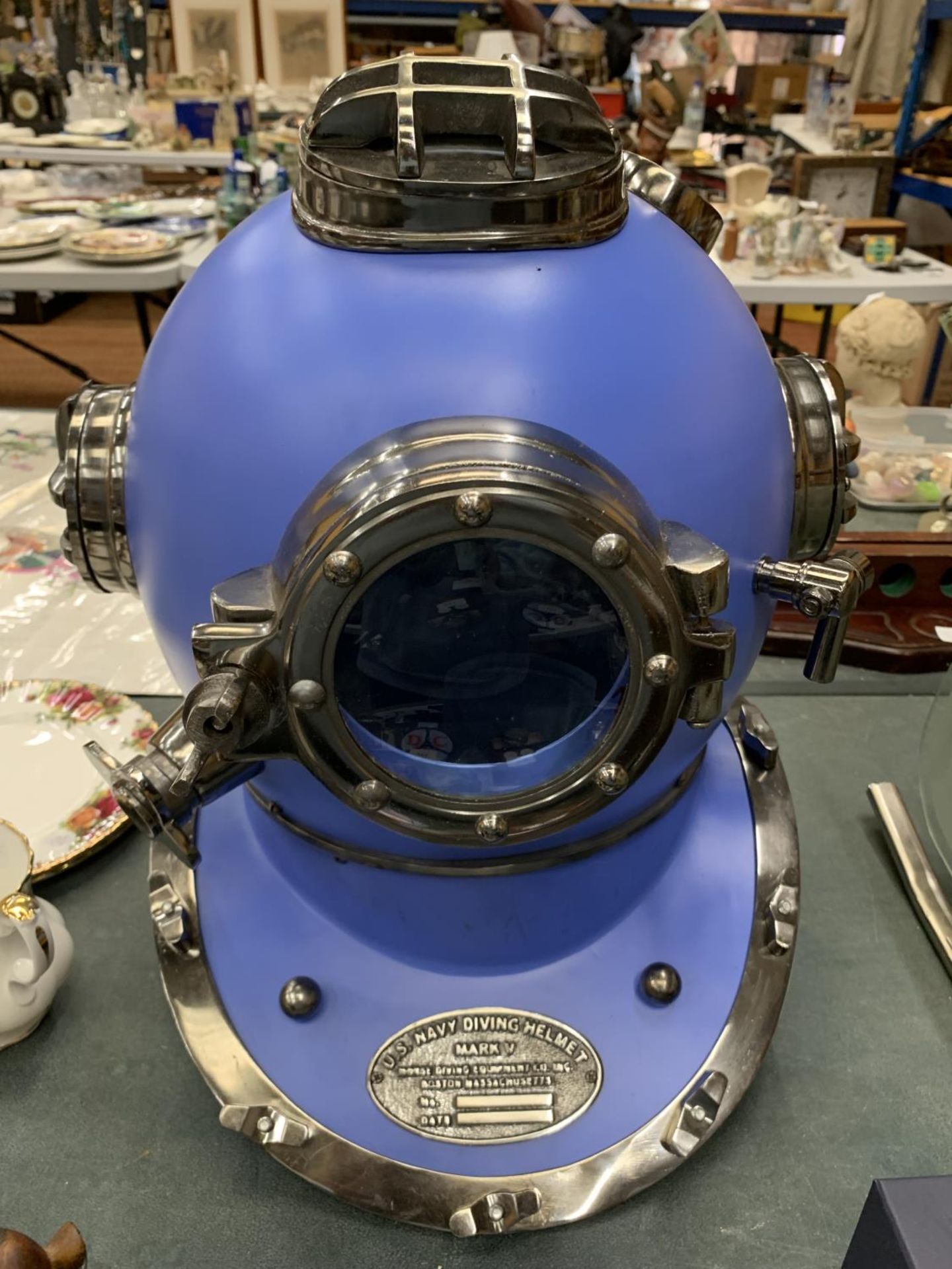 A LARGE BLUE AND CHROME DIVERS HELMET