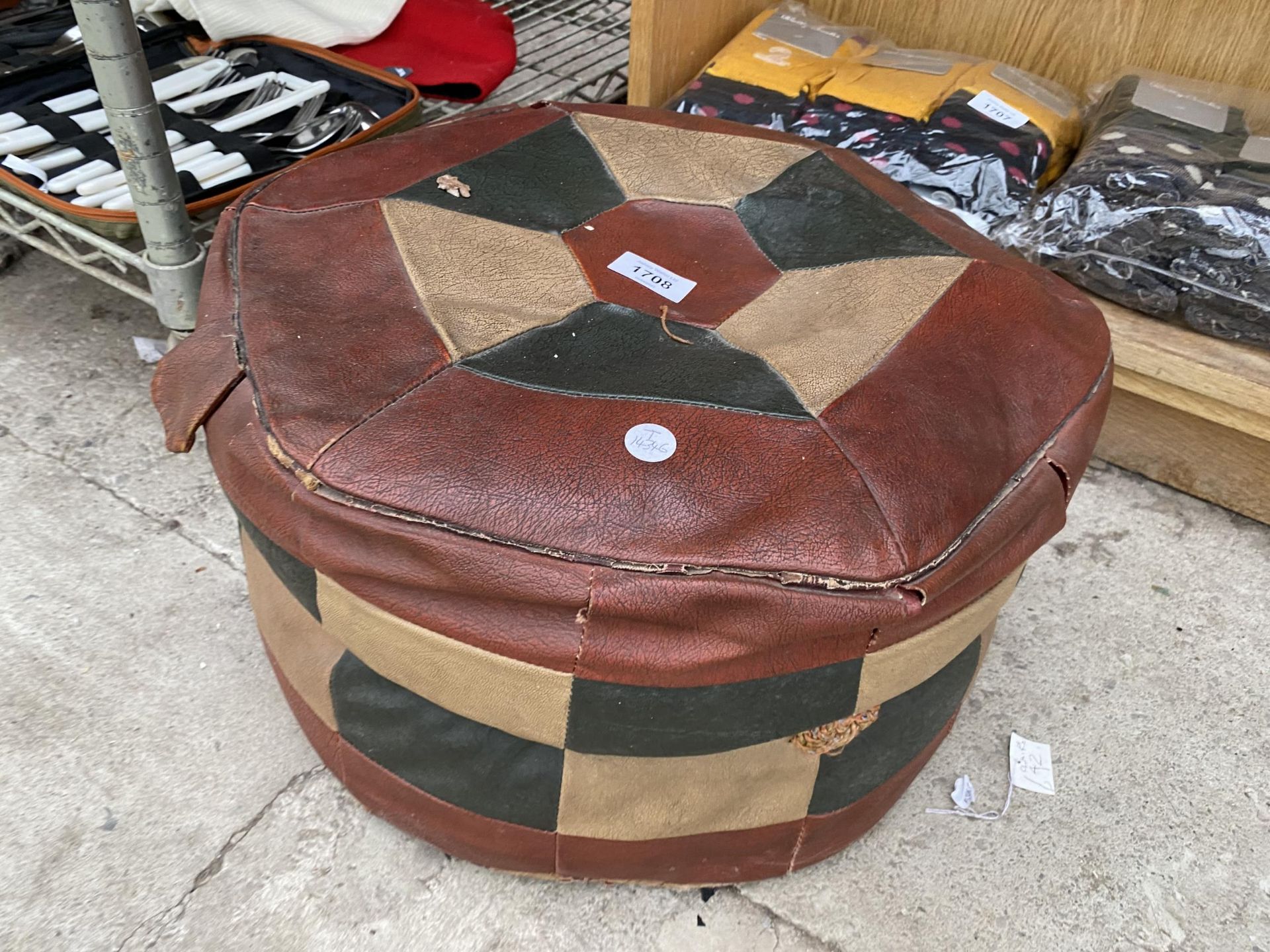 A VINTAGE LEATHER FOOT STOOL