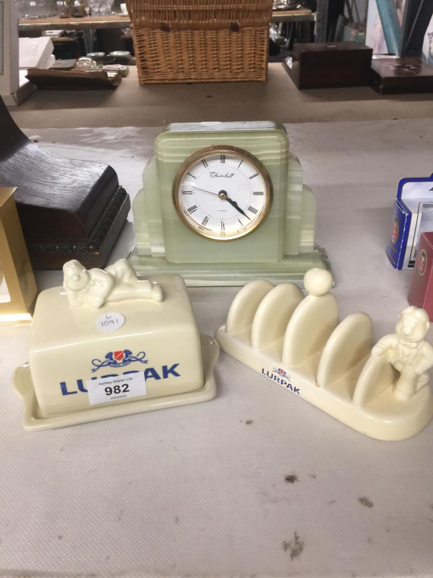 A VINTAGE CHURCHILL ONYX MARBLE MANTLE CLOCK TOGETHER WITH A LURPAK BUTTER DISH AND TOAST RACK