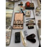 A MIXED LOT TO INCLUDE BOXED STUDS, POKER DICE, VINTAGE BOXED TEASPOONS, PLAYING CARDS, PENS,