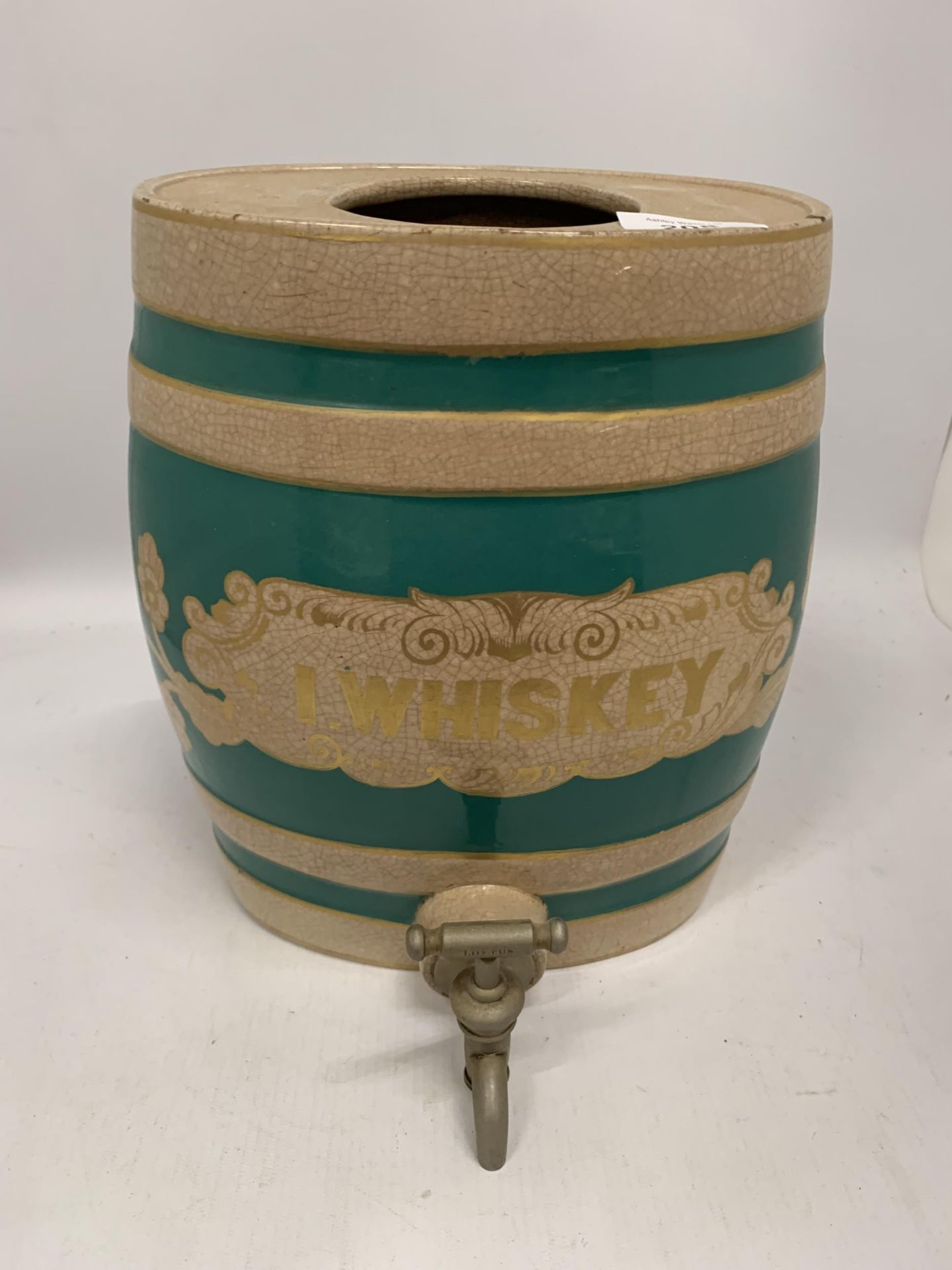 A VINTAGE CERAMIC WHISKEY BARREL DECANTER