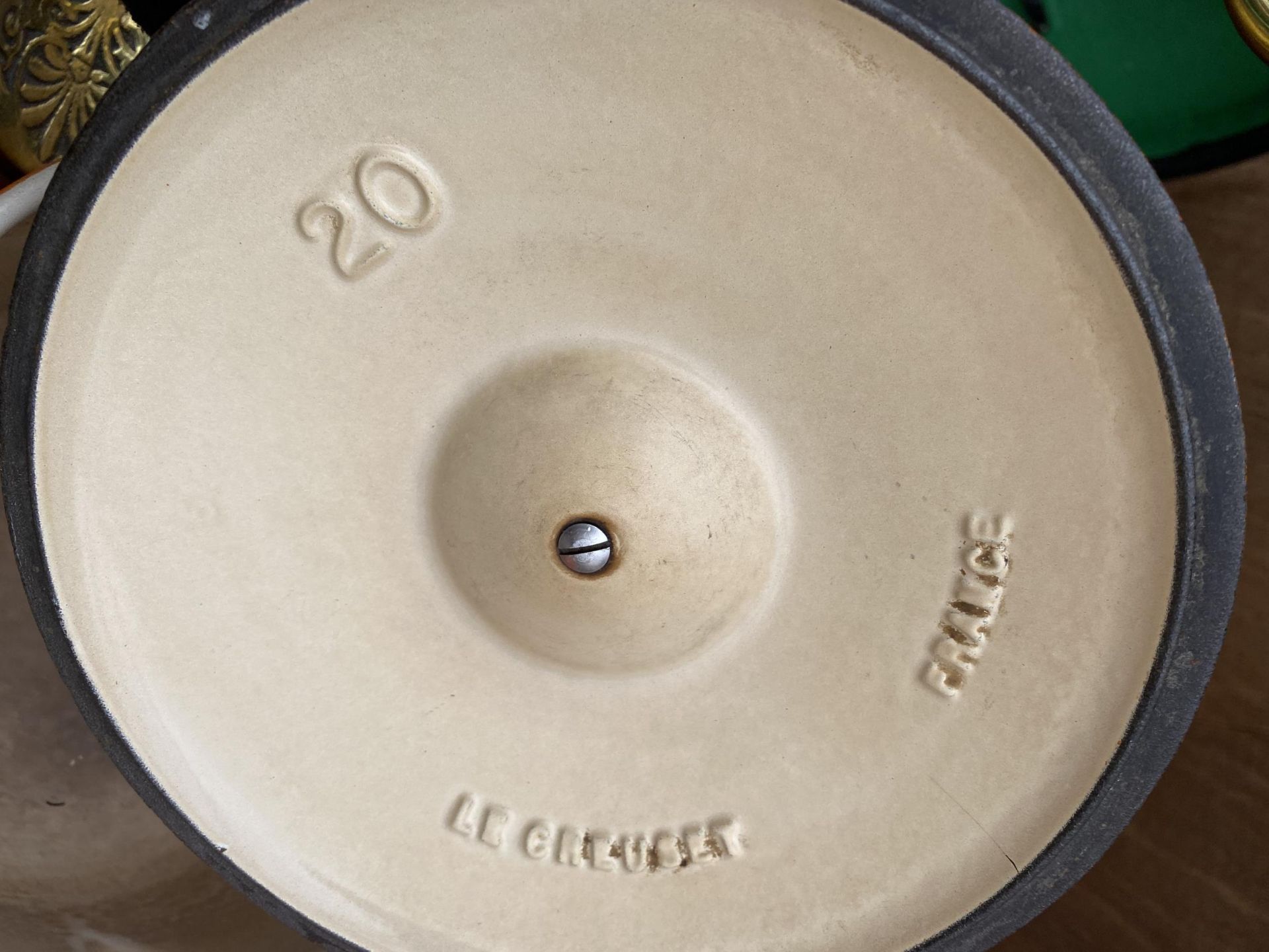 FOUR GRADUATED ORANGE LE CREUSET PANS WITH LIDS AND WOODEN HANDLES - Image 2 of 3