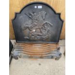 A LARGE FIRE GRATE AND A DECORATIVE CAST IRON FIRE BACK