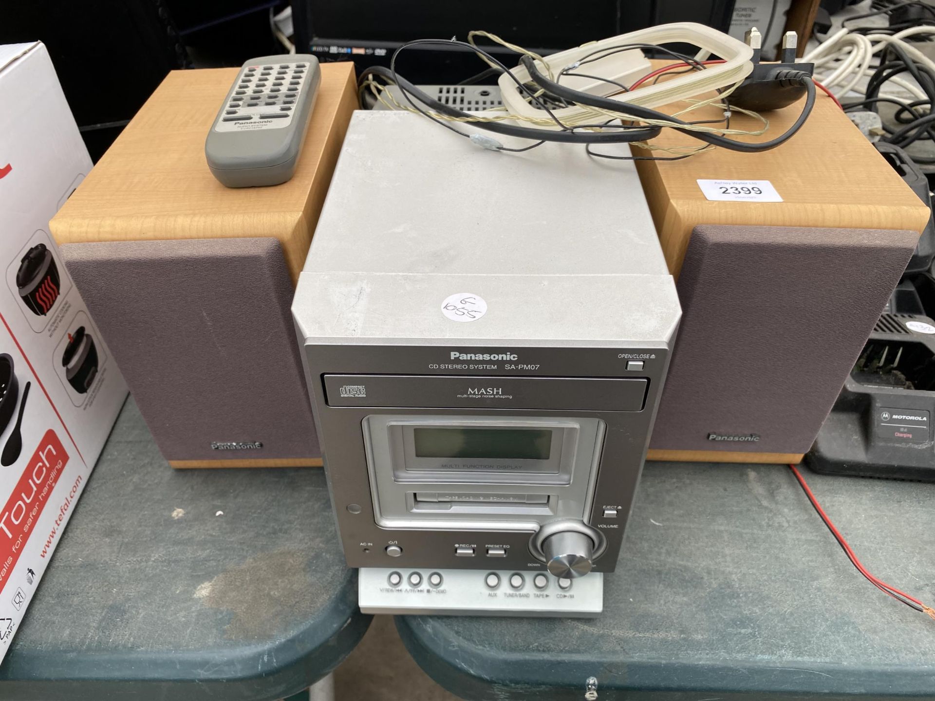 A PANASONIC STEREO SYSTEM WITH TWO SPEAKERS