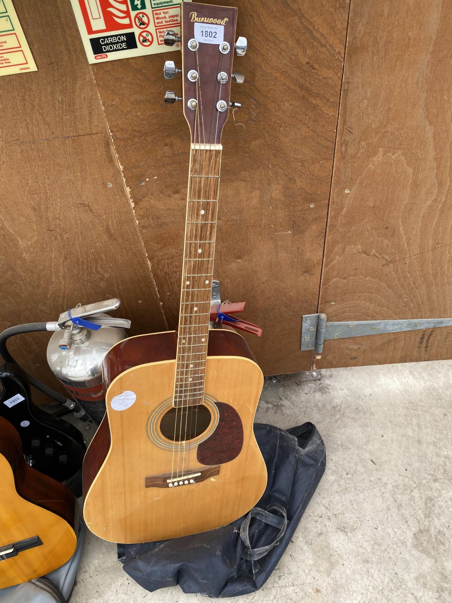 A BURSWOOD ACOUSTIC GUITAR