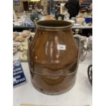 A VINTAGE COPPER MILK CHURN WITH HANDLE