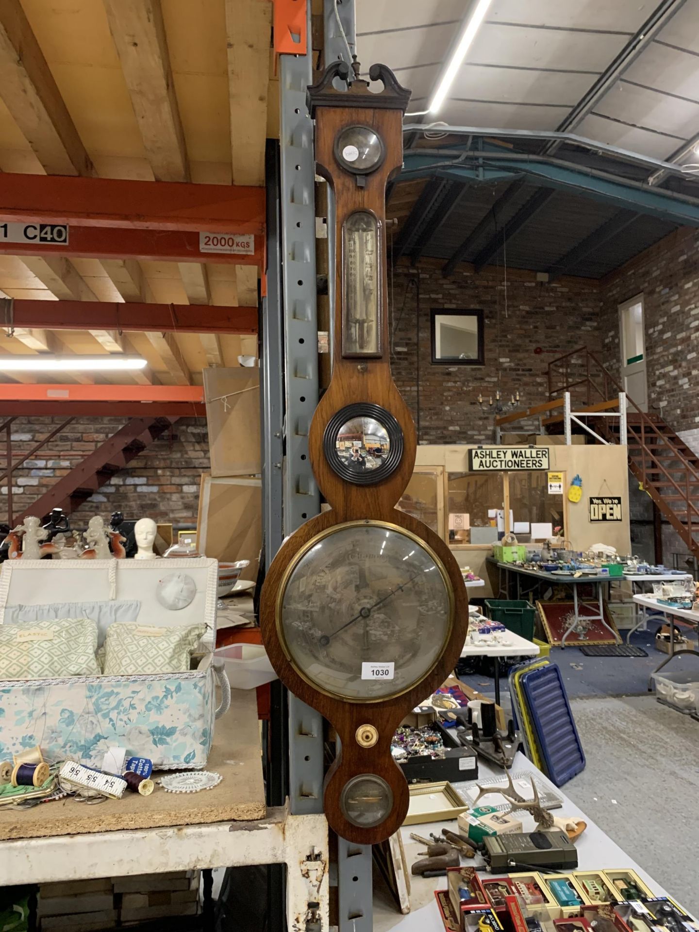 A VICTORIAN MAHOGANY BANJO BAROMETER WITH DOMBED GLASS BEZEL