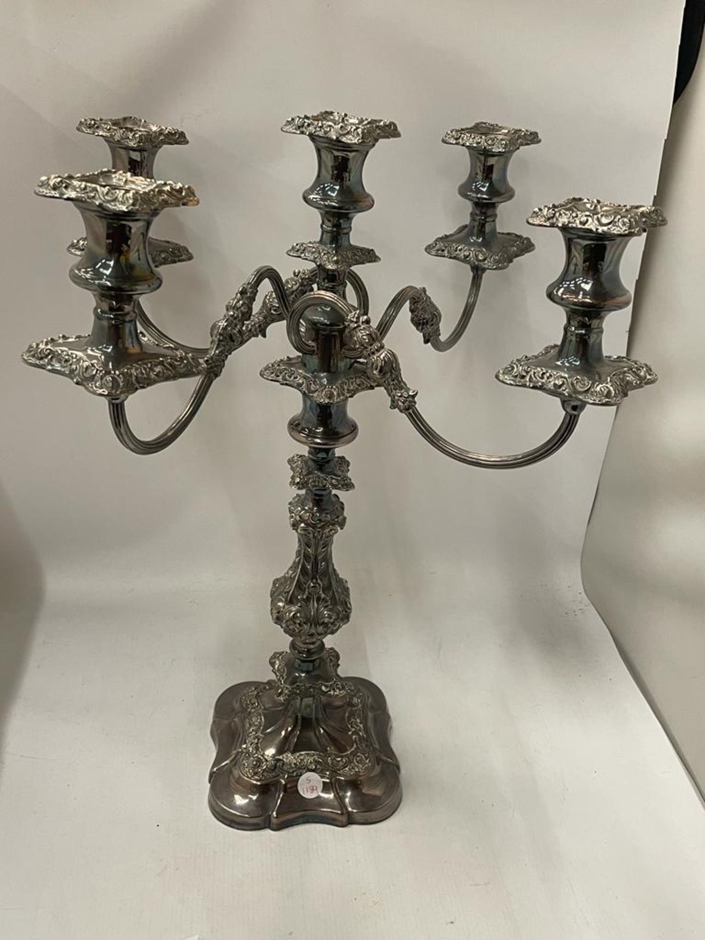 A VINTAGE SILVER PLATED FIVE BRANCH CANDLEABRA WITH PRINCE OF WALES PRESENTATION ENGRAVING TO BASE