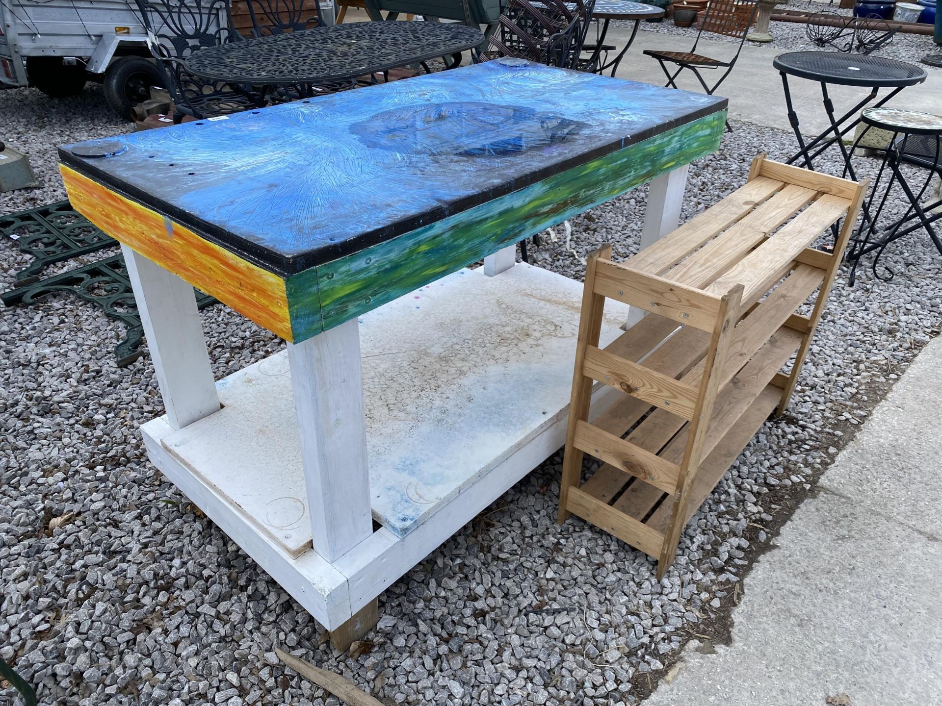 A WOODEN WORK BENCH AND A WOODEN SHELVING UNIT