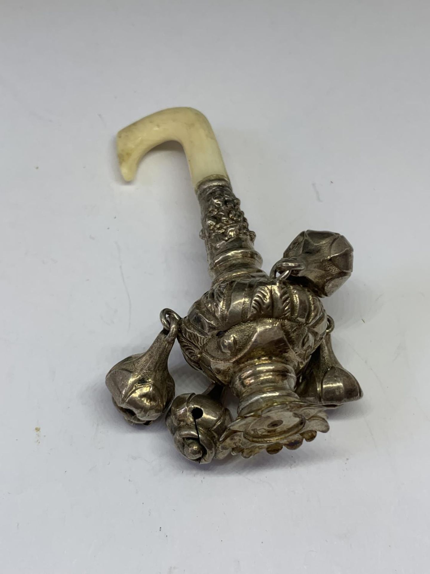 A VICTORIAN SILVER TEETHING RATTLE