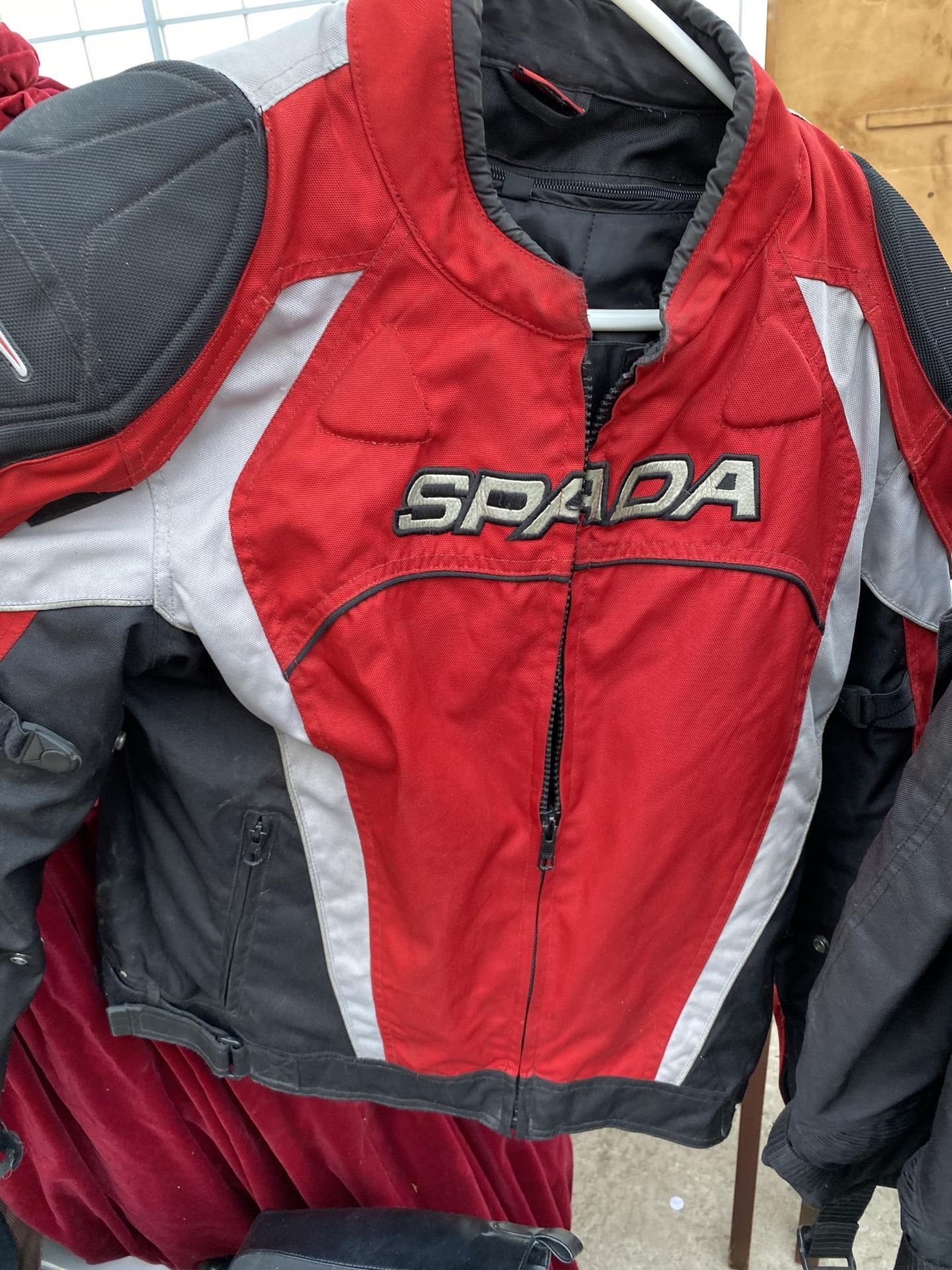 A MOTORBIKE JACKET AND TROUSERS - Image 2 of 3